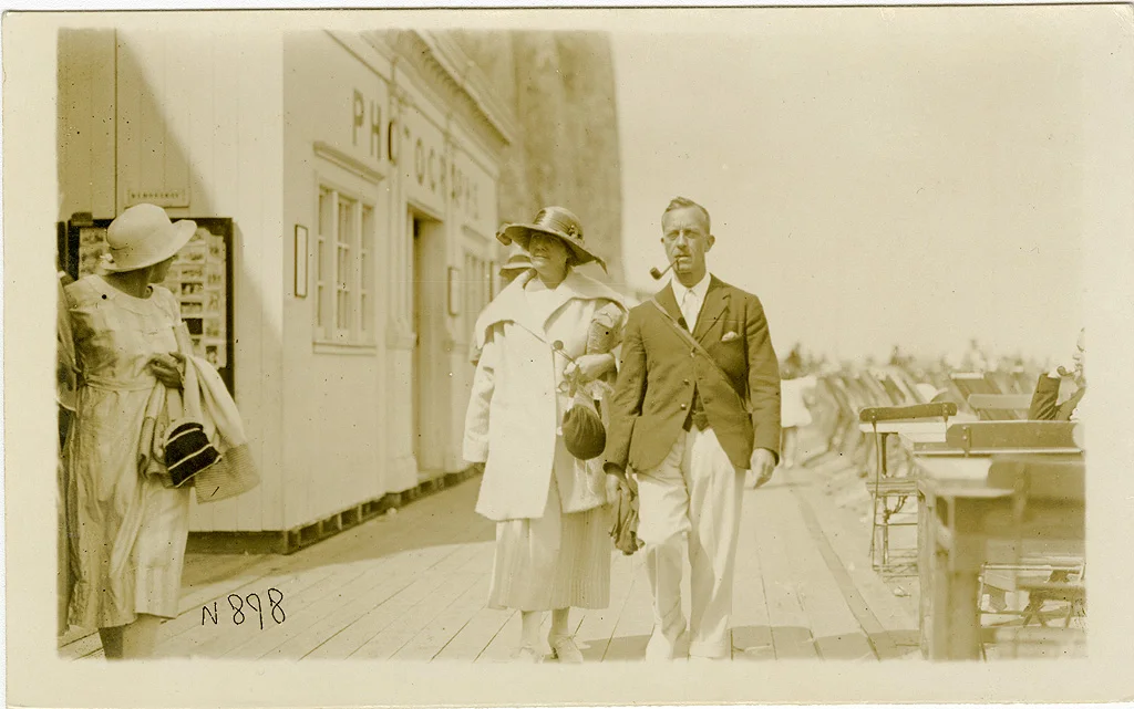 Unkown couple walking Pettman's bathing platform between Newgate Gap and Walpole bay, Cliftonville, Margate, Kent. ©Ralph Billington ©SEAS Photography