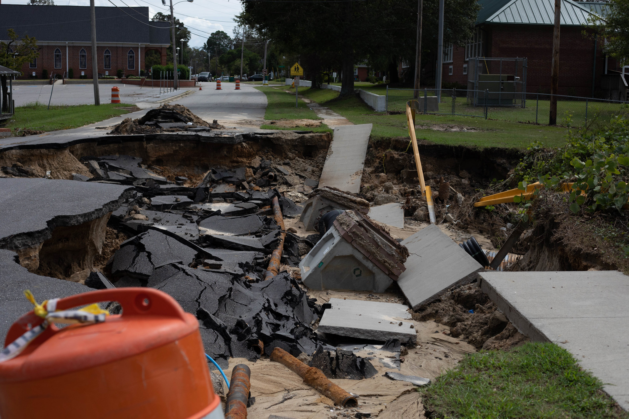 The road in front of the Hargrave Elementary School that completely sunk. School was canceled for over a month after both hurricanes.