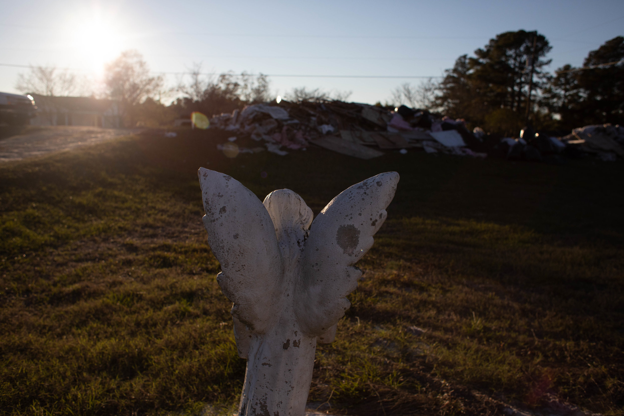 An angel statue that Campbell's mother, Margaret, bought before she passed around the same time as the Hurricane Matthew. "My primary reason is not to go in the house and get paid because we get 00 dollars, but to be the hands and feet of Christ," s