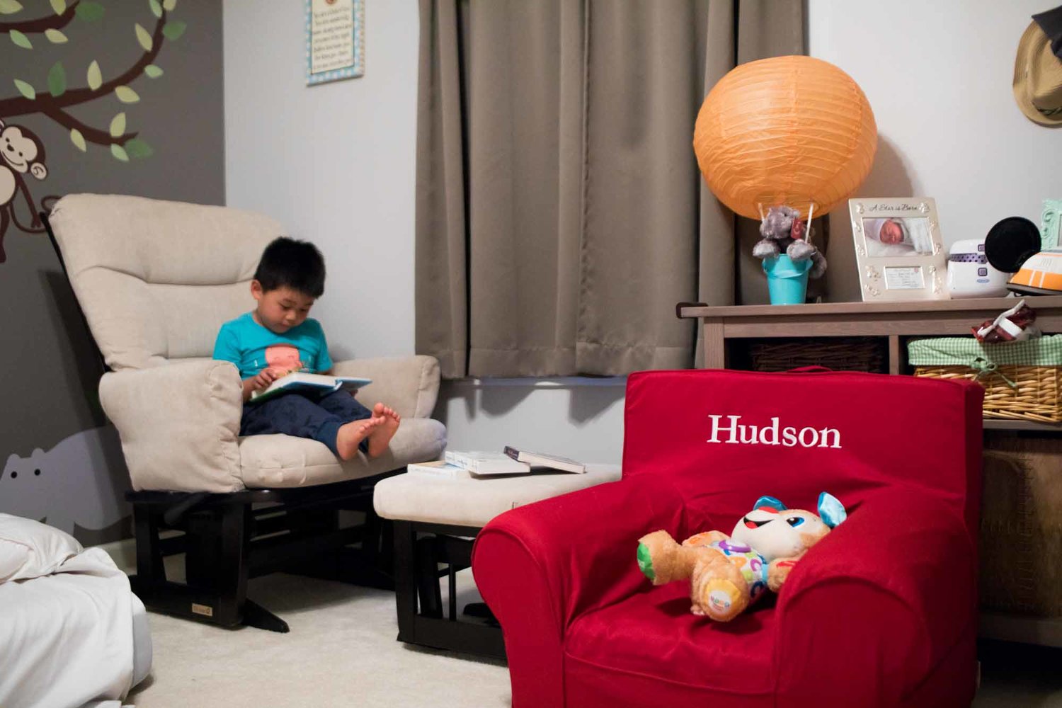 Hudson’s room is set up with toys, pictures, maps and bible verses to celebrate his coming arrival. Josiah Yoo loves to sing the alphabet alongside the singing stuffed dog in Hudson’s chair. Yoo said, “My son is on the spectrum so advocating for spe