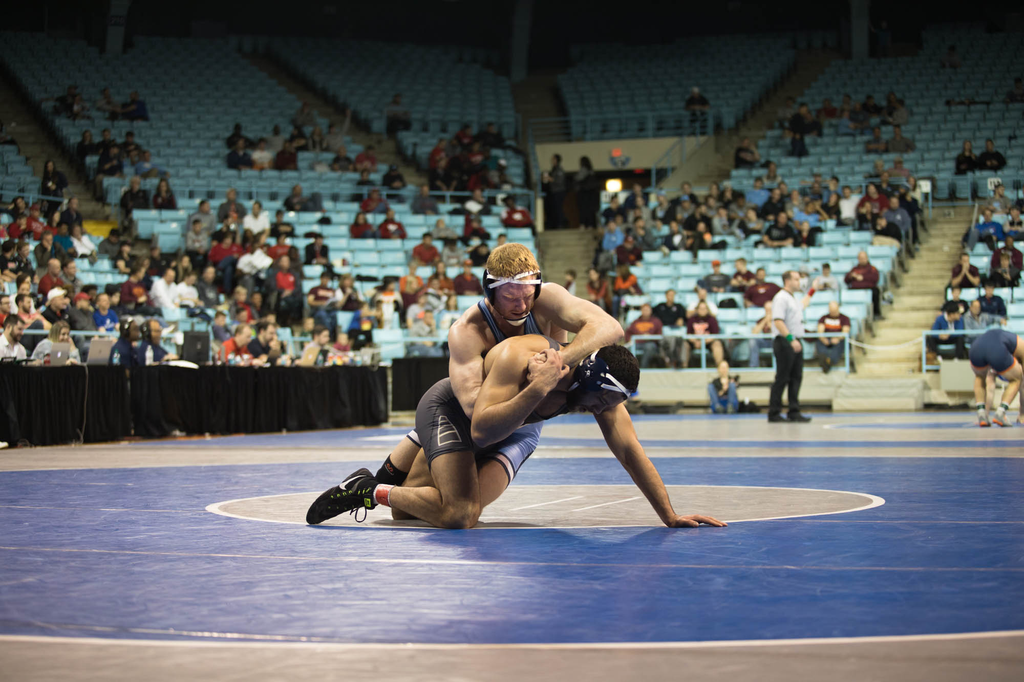 Daniel Chaid, senior, winning against the Pittsburgh player during the ACC Championship. Chaid has a tattoo on his arm of a samurai named Miyamoto Musashi. "The main back story of my tattoo is that my god father was a wrestler named Dave Schultz. D