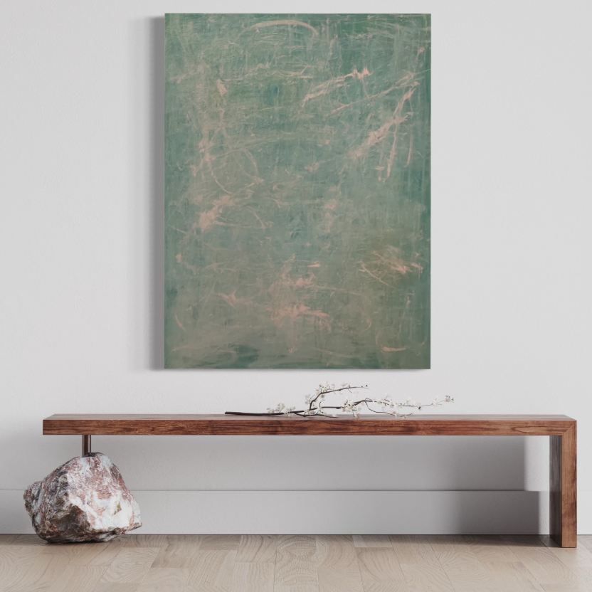 Minimalist interior with a large abstract painting on a white wall, a wooden bench below, and a decorative branch on the bench, with a large rock on the floor to the left.