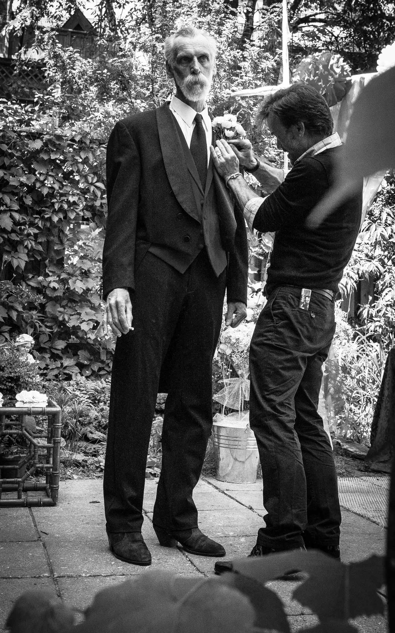 Bob-and-Michael-Fastening-Boutonnière-1896.jpg