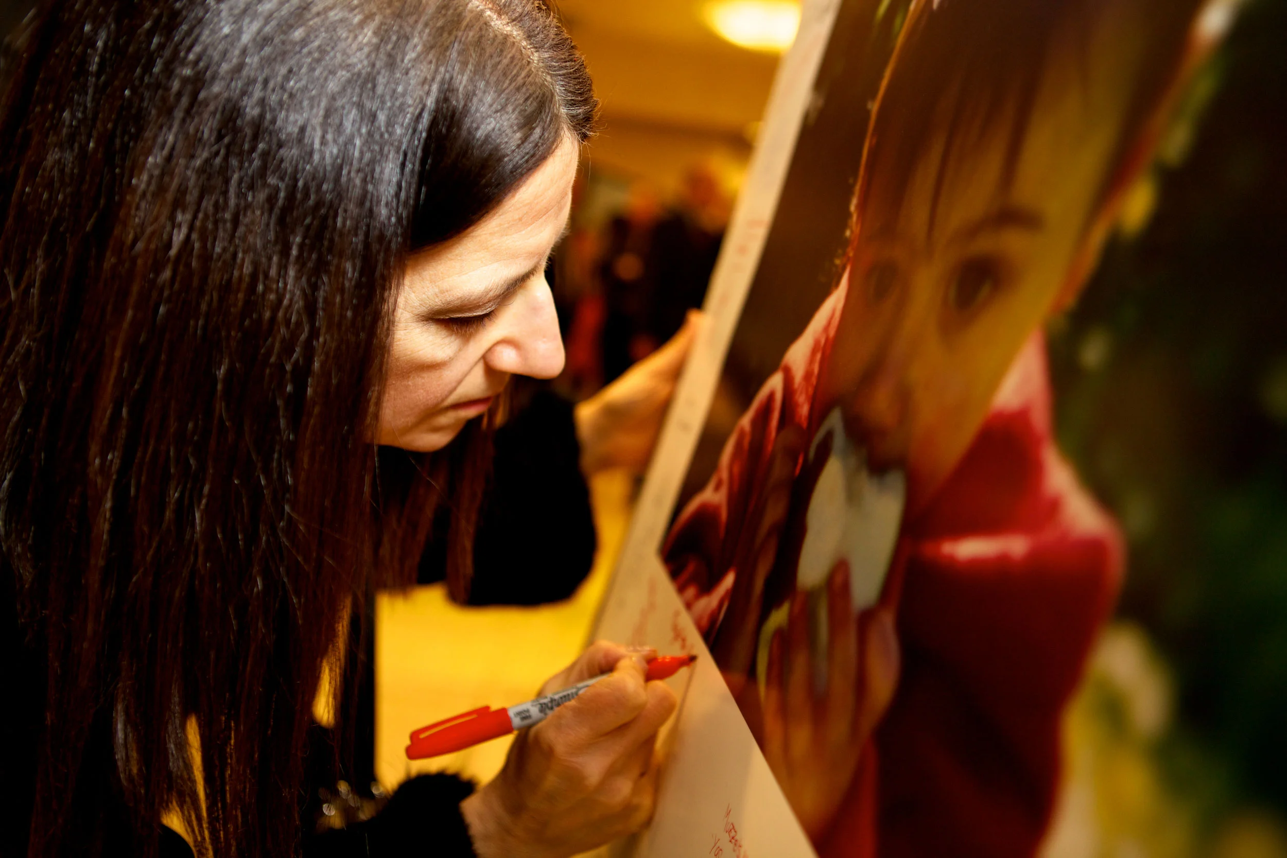 Lady-Signing-Photo-SS.jpg