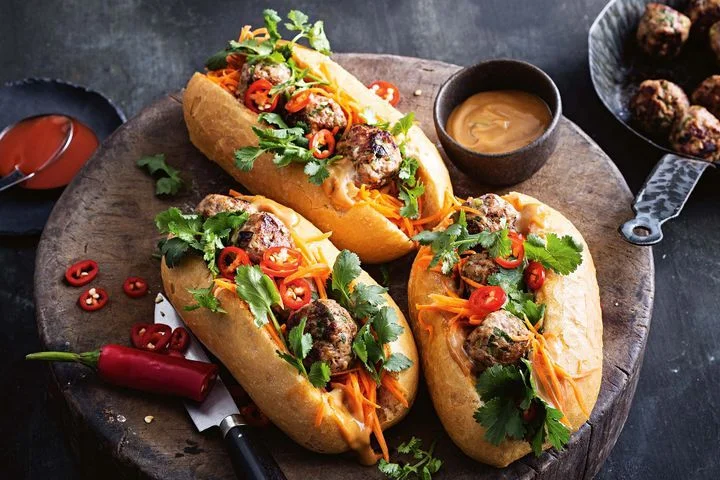 Chicken Meatballs with Pickled Vegetables over fresh baguette