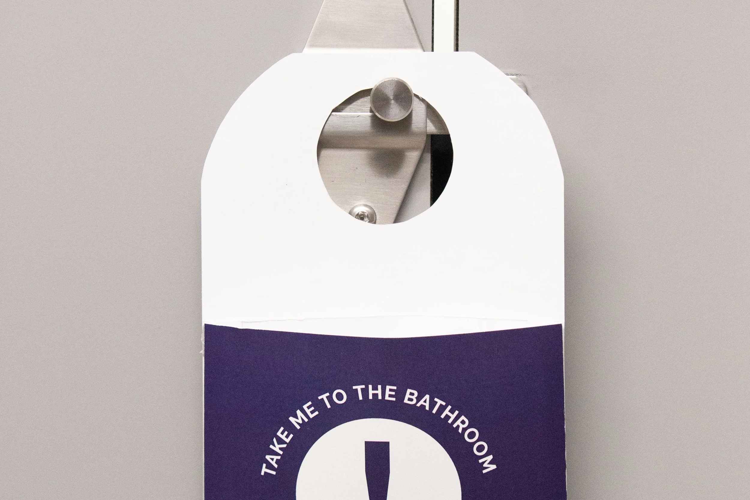 Hanger can easily hang on bathroom door with test contents