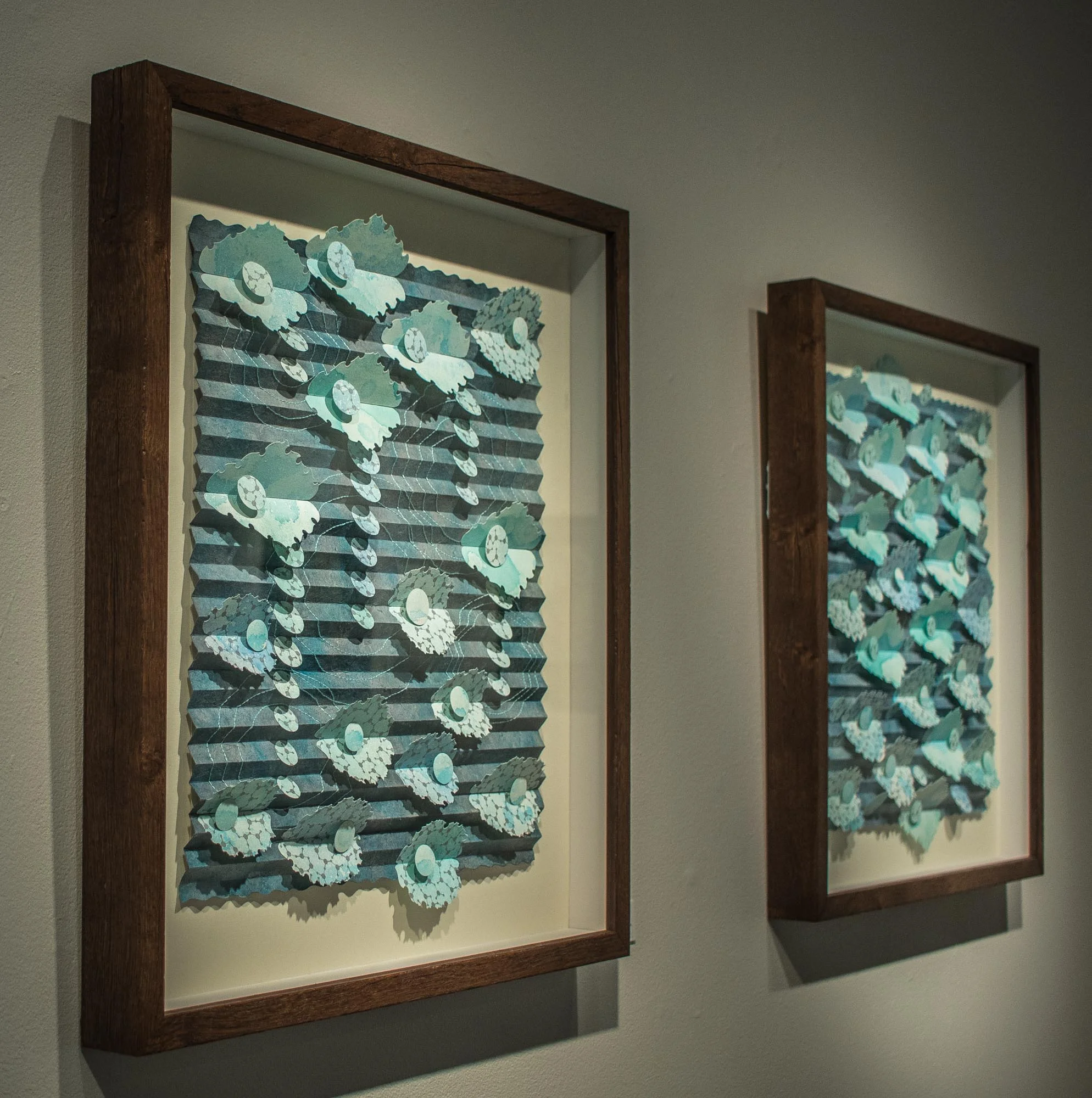 Paper sculptures Lily Pond II and Ripples II from the CloudWater series . Photo credit: Kamala Dolphin-Kingsley.