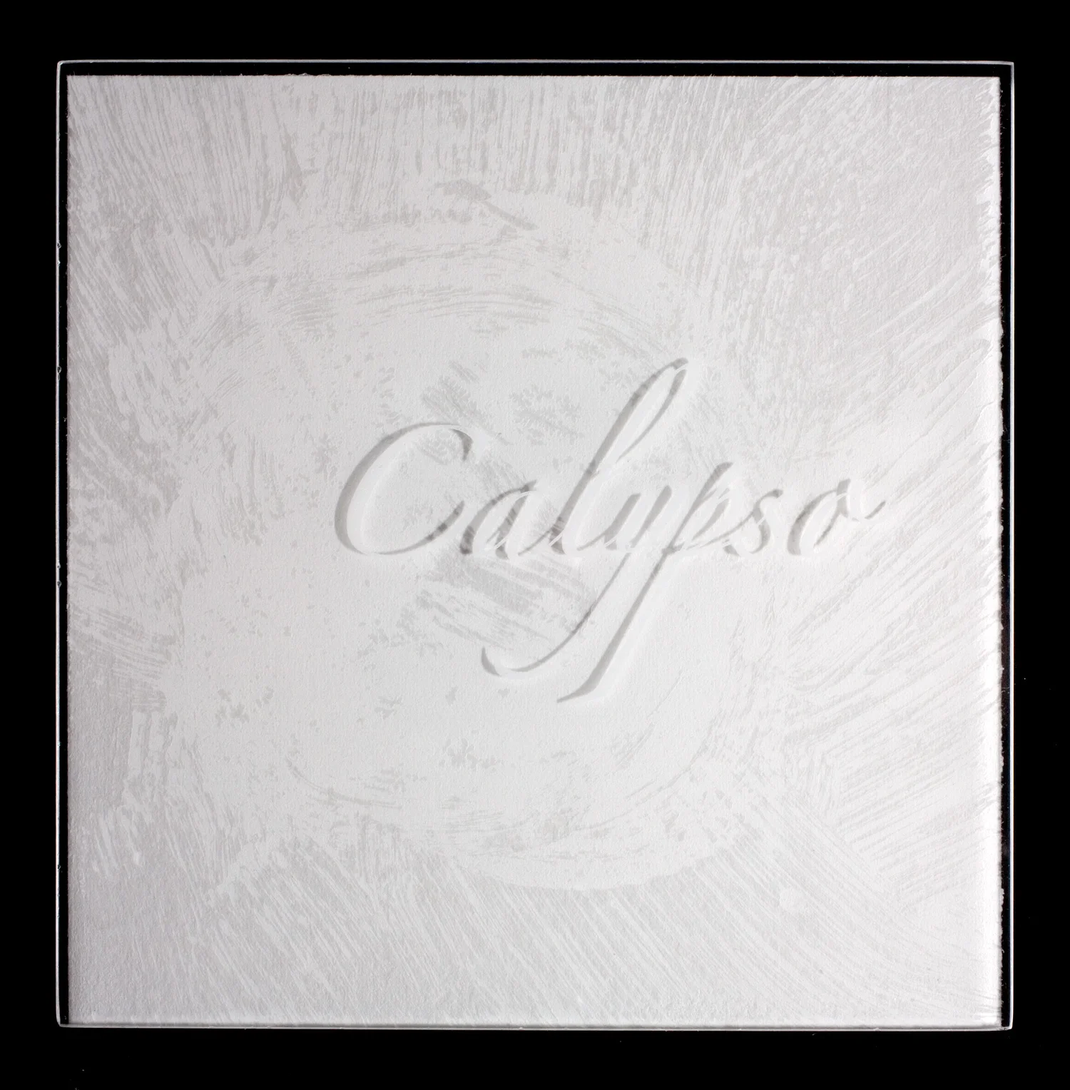 Plexi cover printed in white ink over white paper, the title is legible only by the shadow it casts.