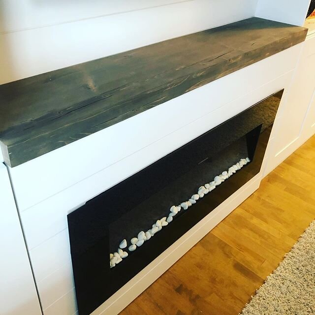 We finished this built-in fireplace, cabinets, and shelving up just in time for Christmas!  Hidden cabling for media, #shiplap, and a custom solid pine mantle really make this piece super clean and eye catching! 
#yeg #yegcarpentry #yegcontractor #cu