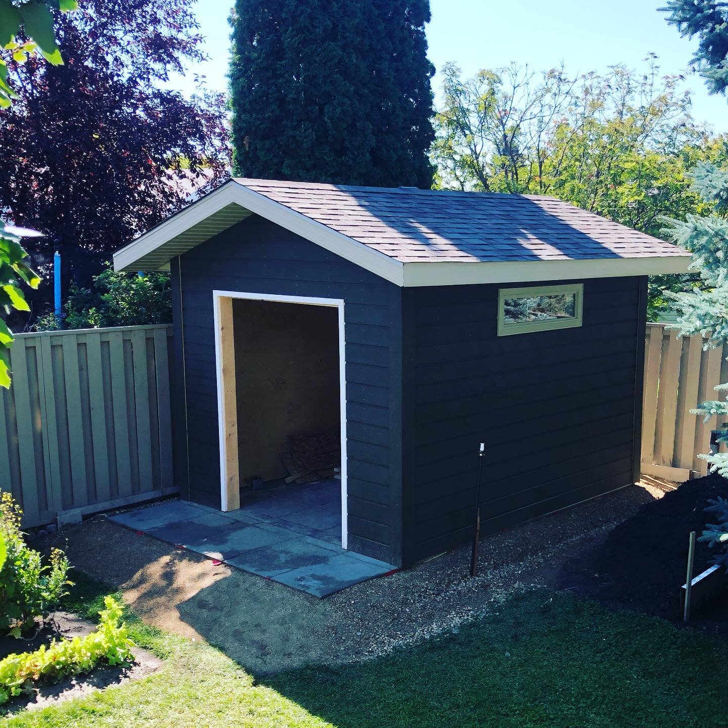 This #custom #shed build is ready for its finishing touches!  Very happy with the open rafter design to maximize head room.  This entire shed was completely modeled after the home to match everything from the shingles, soffit, fascia, and cedar sidin