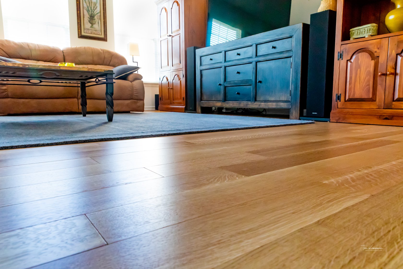 Preverco Brushed White Oak on Main Level and Luxury Vinyl Plank in basement  of beautiful Edgewater home. — Beers Flooring