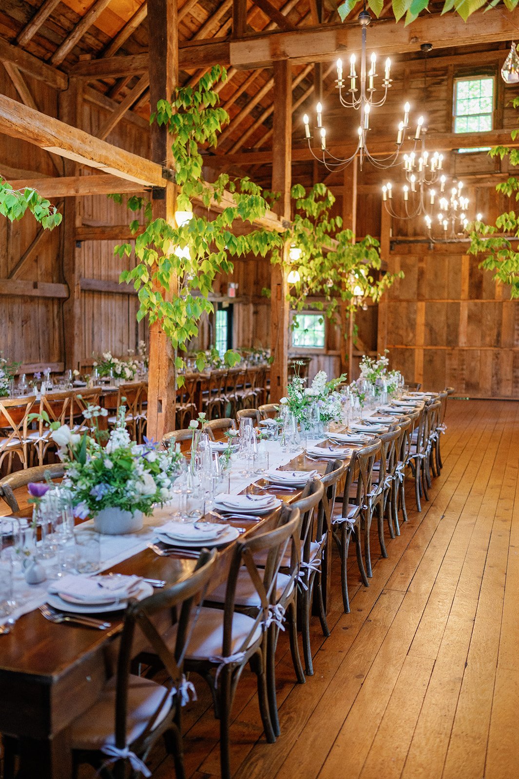 Reception in Candlelit Barn Ready for Guests