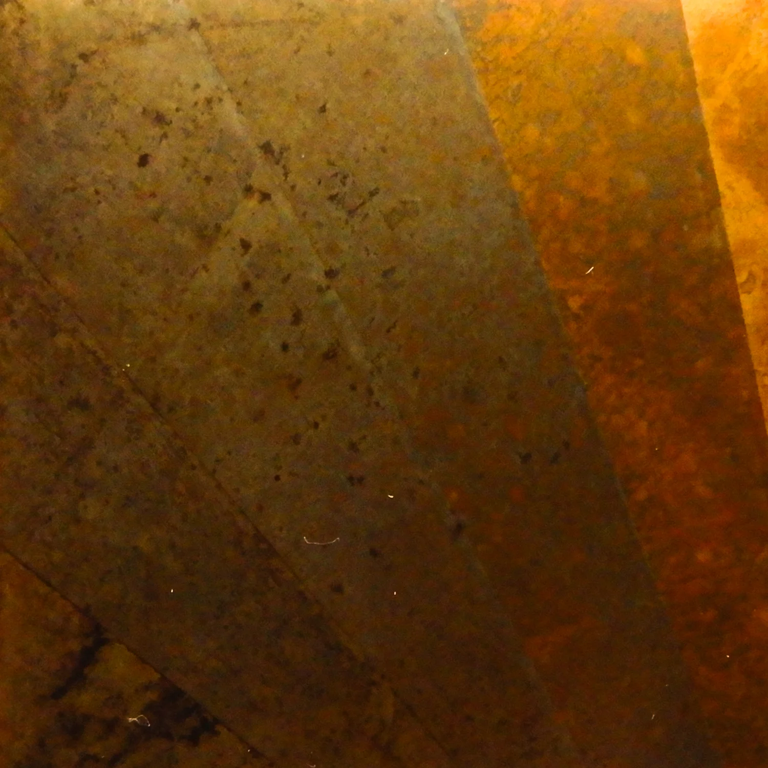 Annealed and sanded by sandpaper. Wrapped in multiple layers of a paper towel saturated with liver of sulfur for different durations (30 minutes to 3 hours) Size: 2 x 2 in