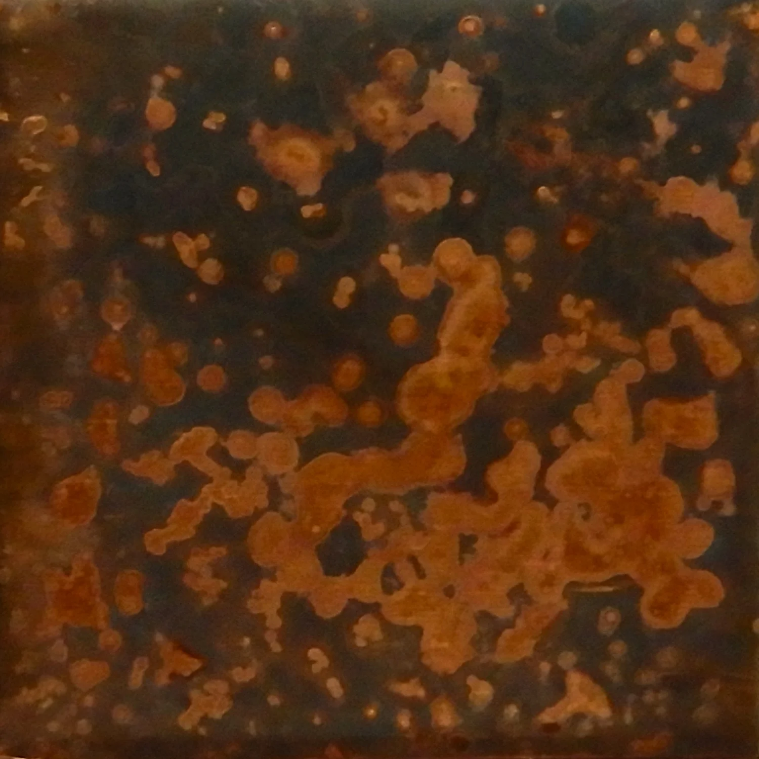 Annealed and sanded by sandpaper and sandblasted. Covered by salt and exposed to ammonia fumes for eight hours in a sealed container. Size 1 x 1 in