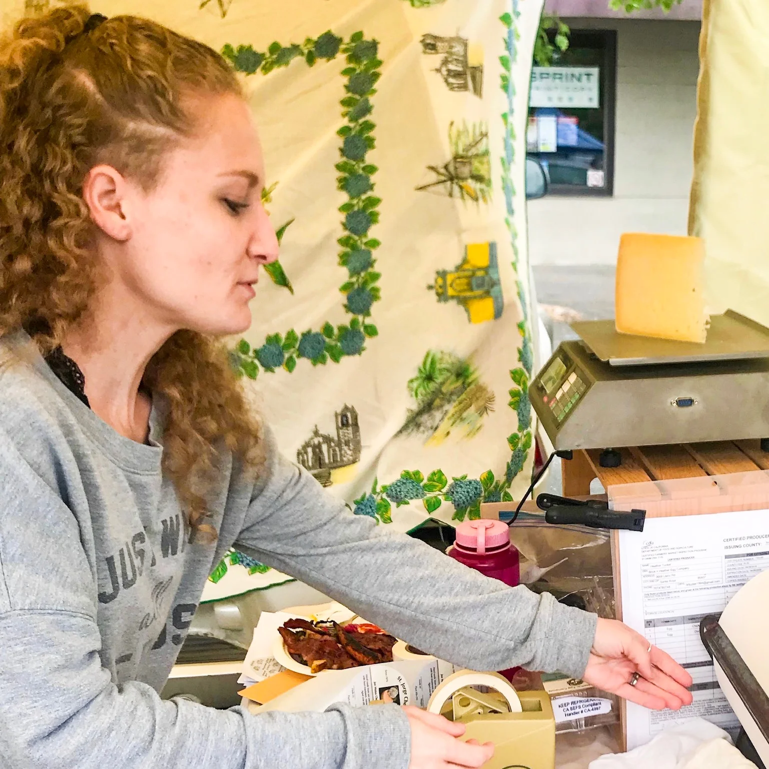 Buying a local Portuguese-style cow's milk cheese and getting some travel advice about the Azores