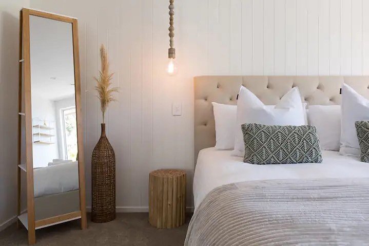 Hanging Pendant lights next to a bed creates a unique look and removes the need for bedside table lamps that can often look cluttered.