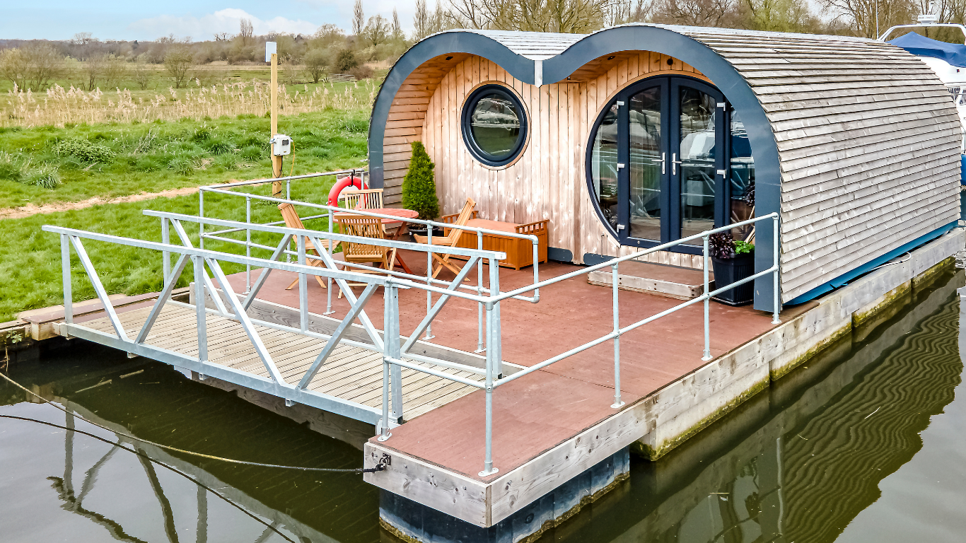 Secret Waters floating deck holiday home on the Norfolk Broads at Hippersons Boatyard web image.png