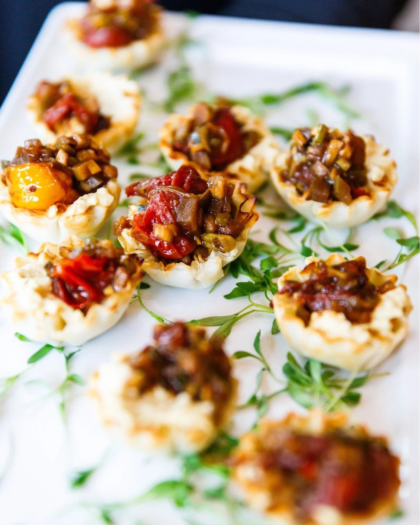 From the first passed app to the final bite of dessert, we work with our partners to create menus that feel like an extension of the event itself. Every flavor, every plate, every garnish&mdash; designed to reflect the theme and elevate the experienc