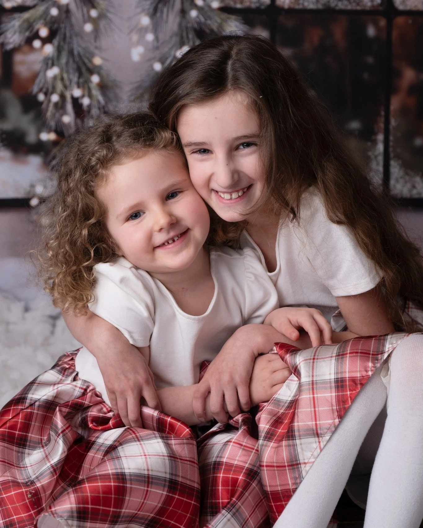 The bond between these two gorgeous girlies was very special to capture this festive season 🎀

Having photographed them both since the littlest was a newborn (with one of their images together having graced the main spot on my website homepage ever 