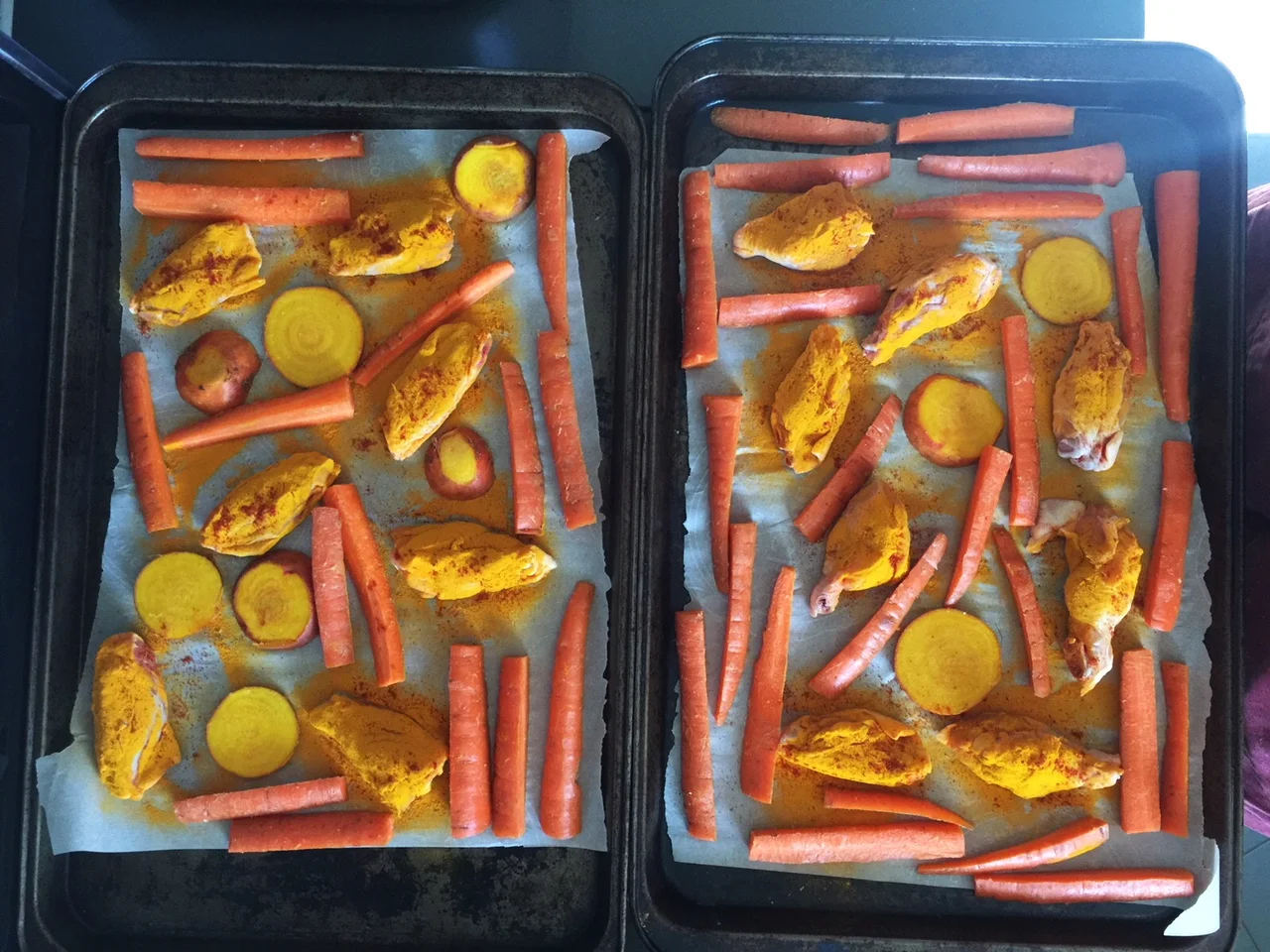 Ready to go in the oven; leaving enough space between things on the tray will enable them to roast (too close and they will steam)