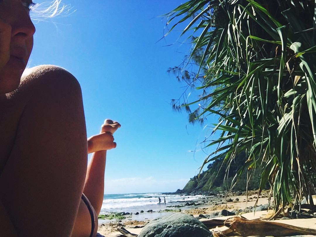 Basking in the sun on the eve of a new moon- at one of my favourite beaches on this planet: Watego's, Byron Bay, Australia.