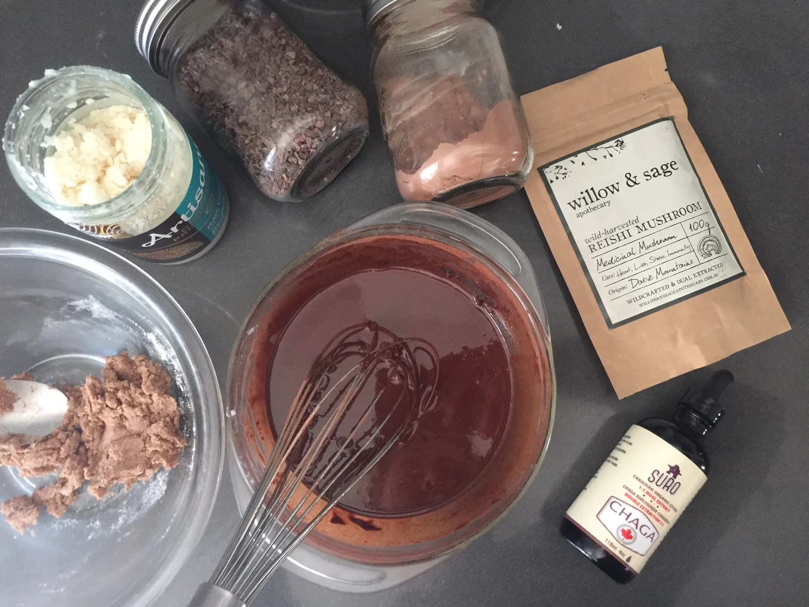 Once the coconut oil/ butter and the cacao butter are melted, whisk in the collagen, cacao powder, collagen, and cinnamon.