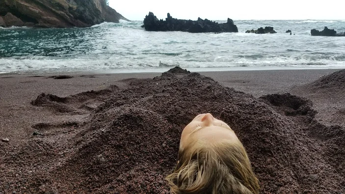 One of the most healing experiences of my life, laying under the heavy weight of the red sand, under the pouring rain.