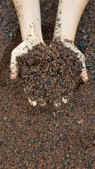 Incredible red sand of Kaihalulu Bay.