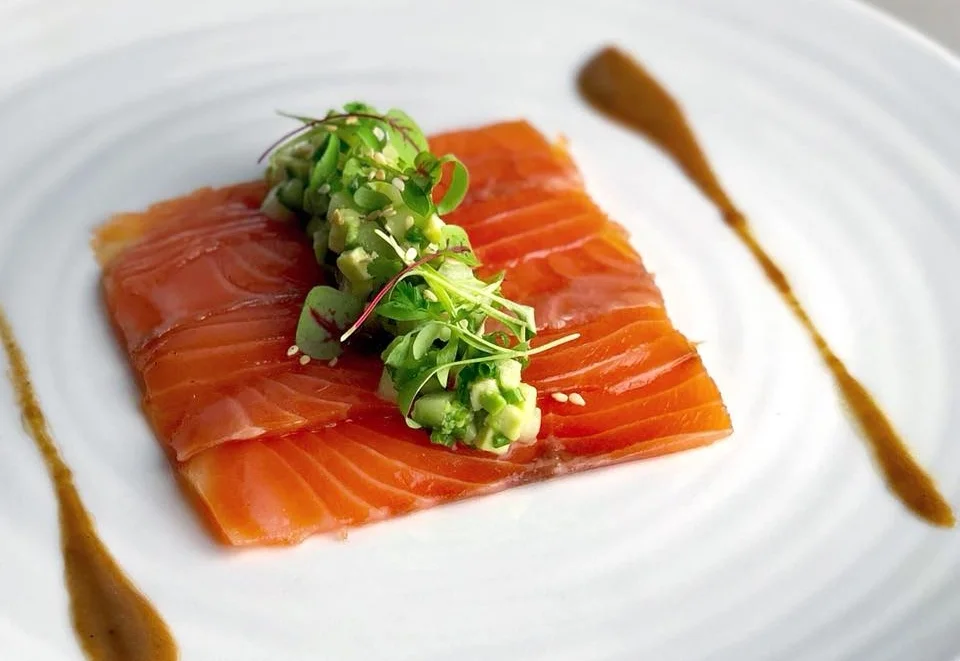 Salmon gravlax with cucumber, avocado, toasted sesame + tamarind sauce at Yew.