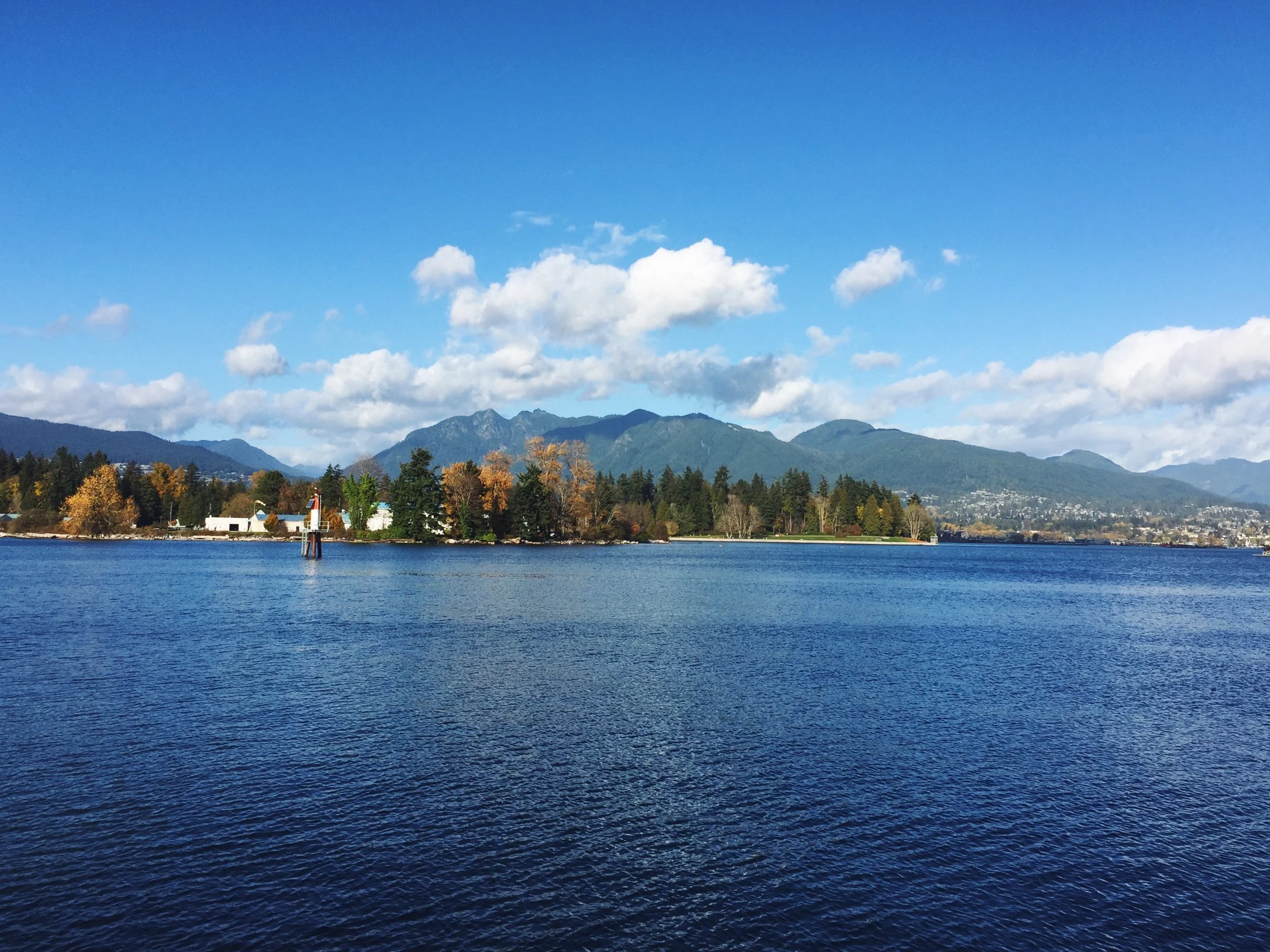 View of the North shore from the waterfront trail, downtown Vancouver.