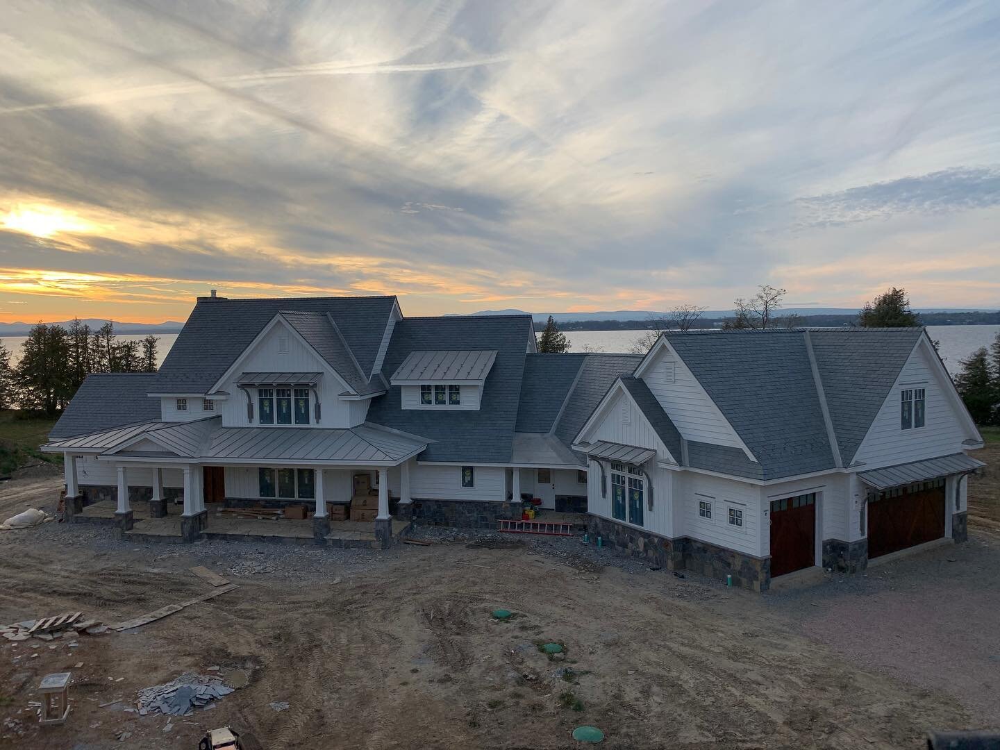 Recently completed roofing project for @redhousebuilding ; Vermont semi-fading Gray slate from @newenglandslate with zinc-coated copper standing seam and flashings. Project foreman: Trevor Therrien