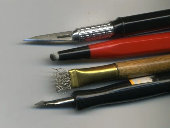 four different scratch tools