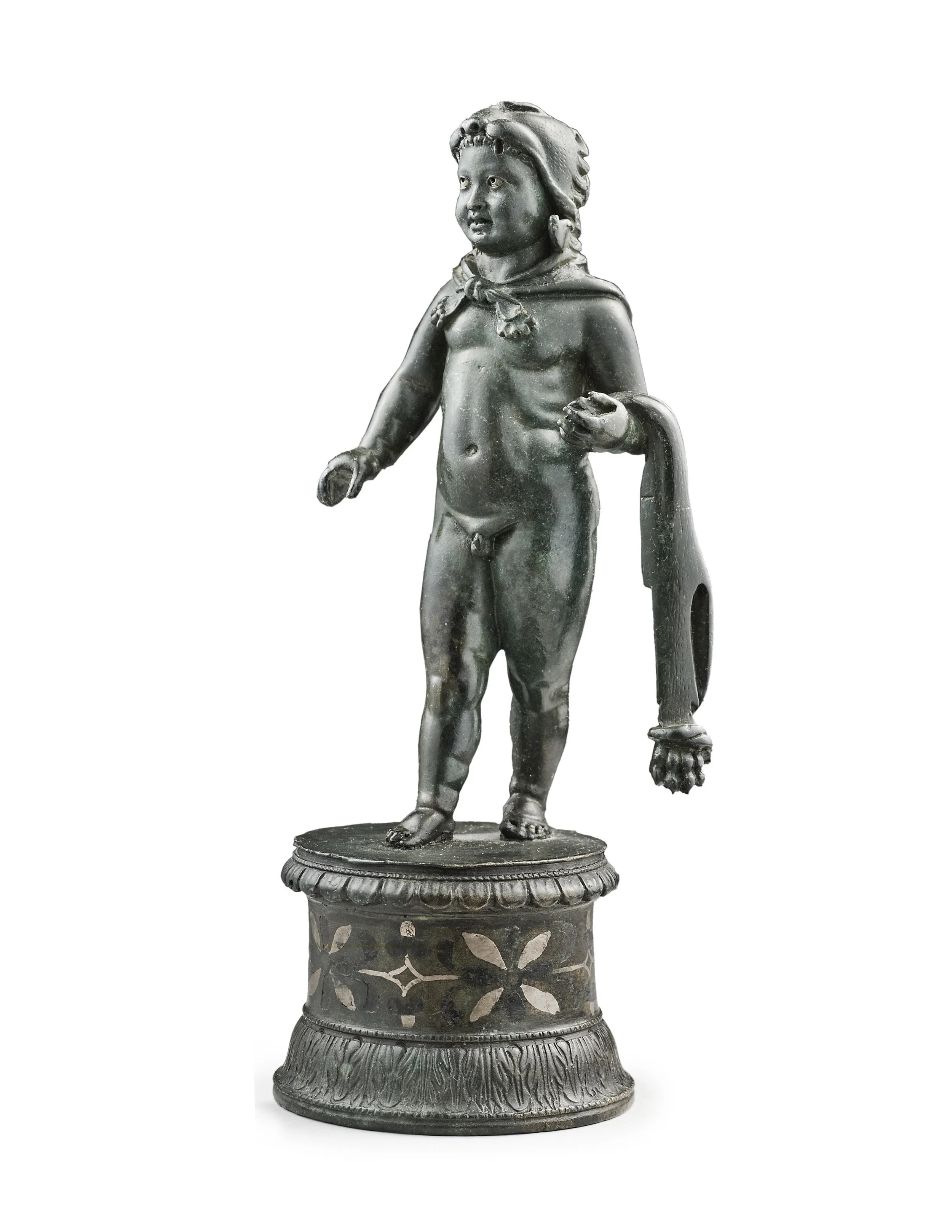  This artfully modeled miniature figure and its ancient pedestal are a true masterpiece of Roman bronze cast and inlay work. The composition presents the infant Hercules in his natural attitude: as he is walking, the right leg steps forward, the body