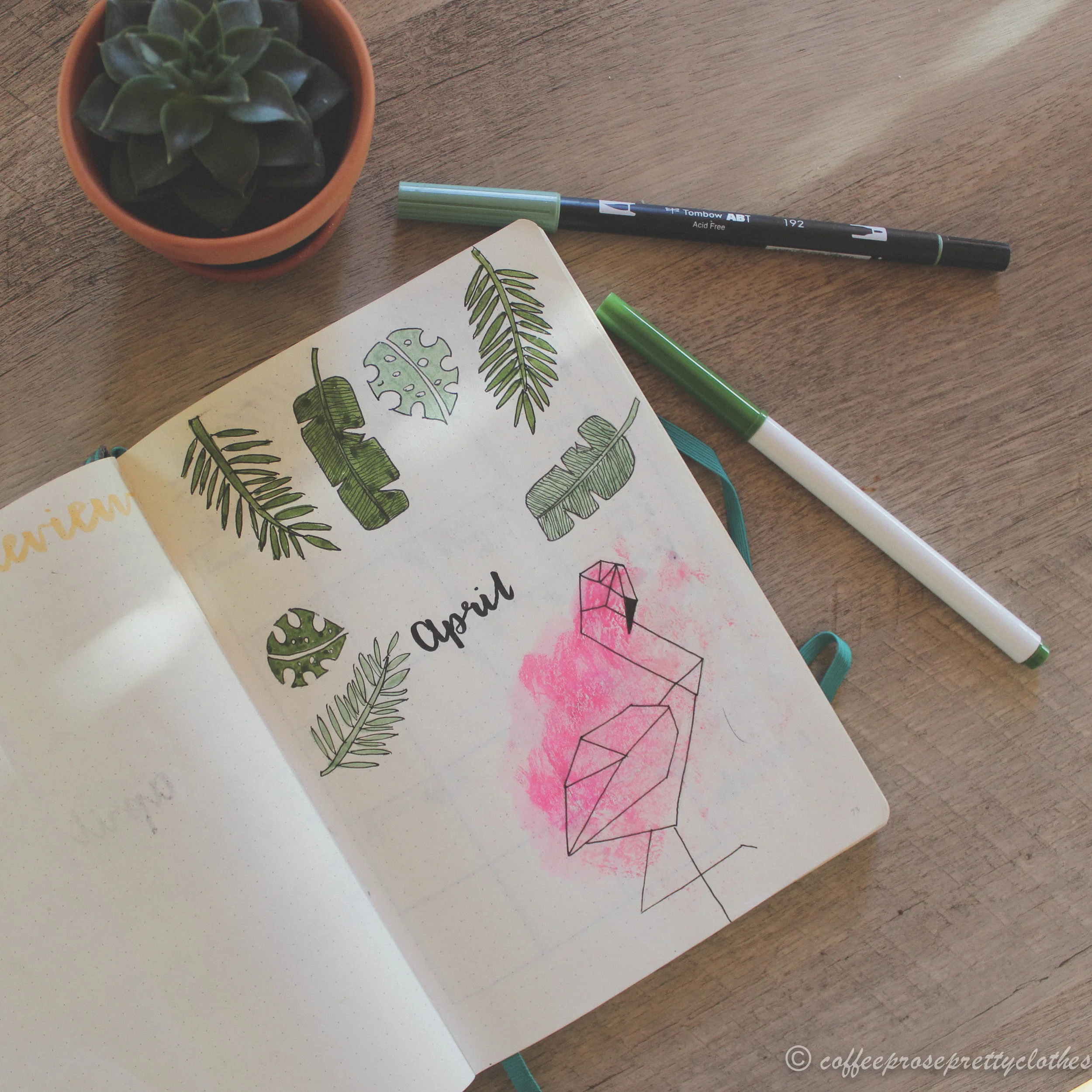 April bullet journal setup with tropical leaf theme and geometric flamingo. Leuchtturm 1917 notebook