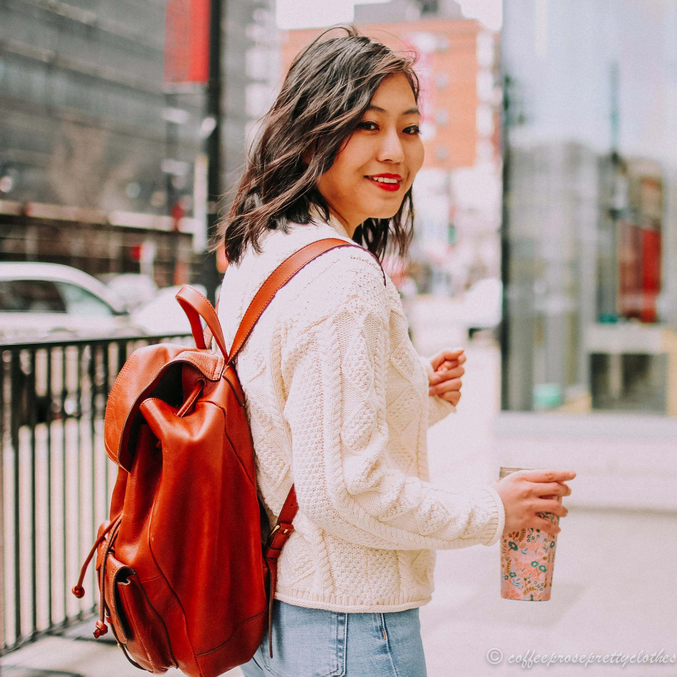Fisher's Sweater and Leather Backpack