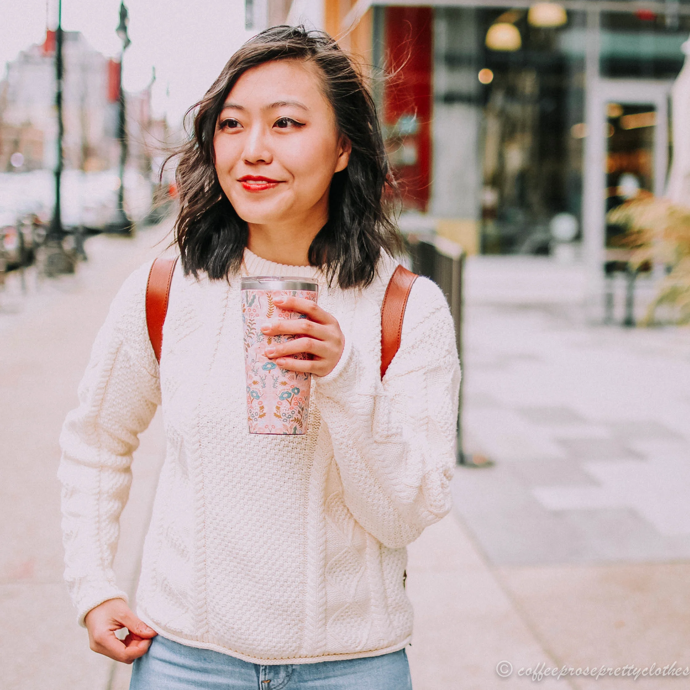 Fisher's Sweater and Leather Backpack