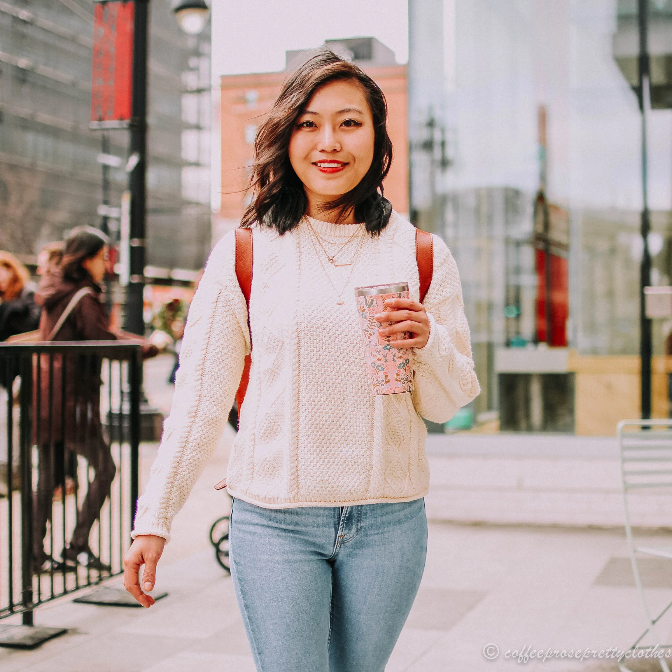 Fisher's Sweater and Leather Backpack