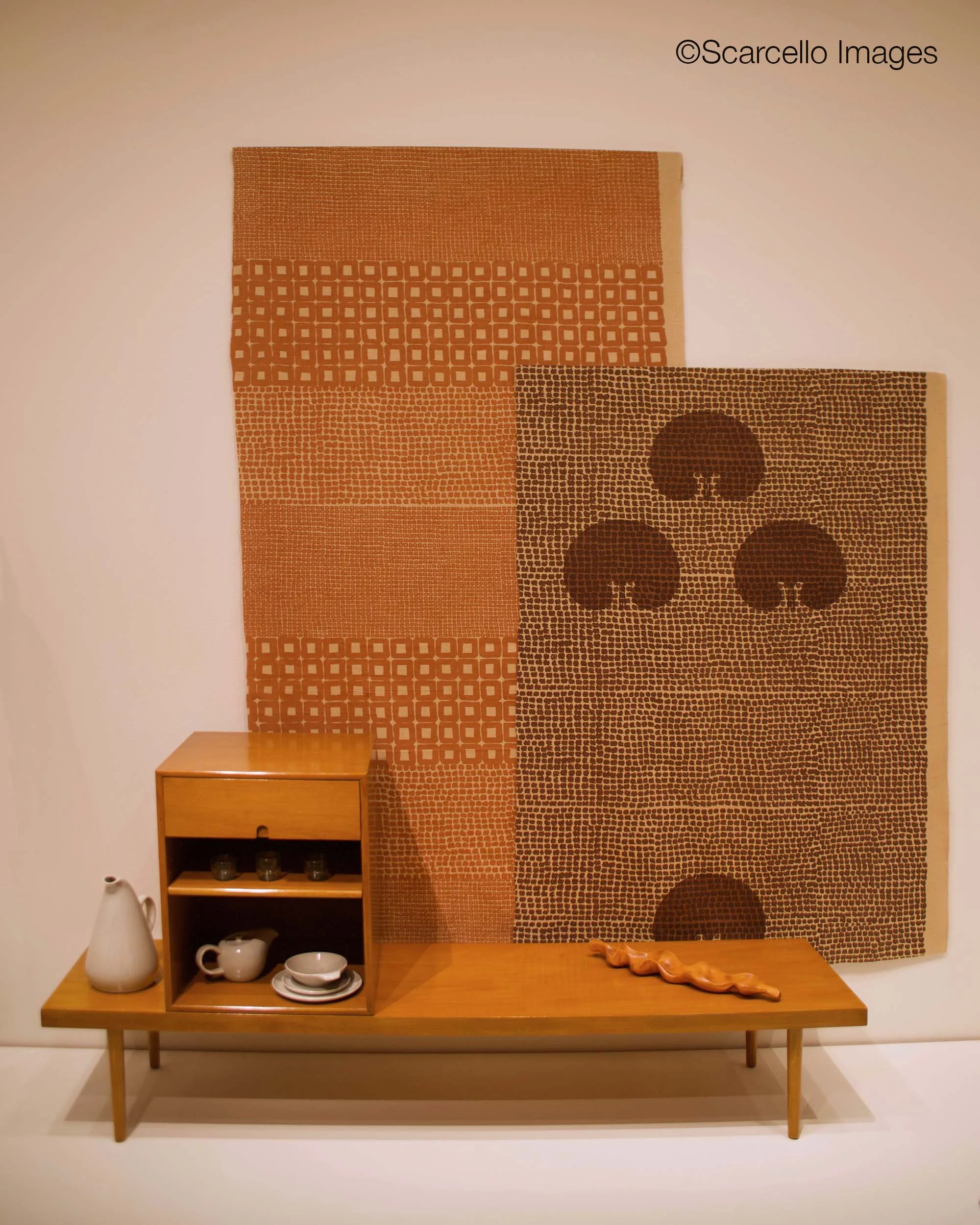 Bench and cabinet by Charles Eames and Eero Saarinen. Fabrics by Noémi Raymond. All 1940.