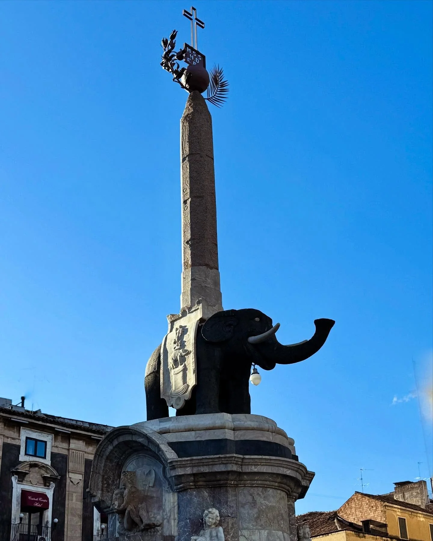 Charming Fontana dell’Elefante in Catania, Sicily featuring a black elephant bearing an Egyptian obelisk and Roman globe. It was sculpted out of lava from Mt Etna in 1736 by Vaccarini. 
2nd shot is of Bernini’s elephant in Piazza Santa Ma
