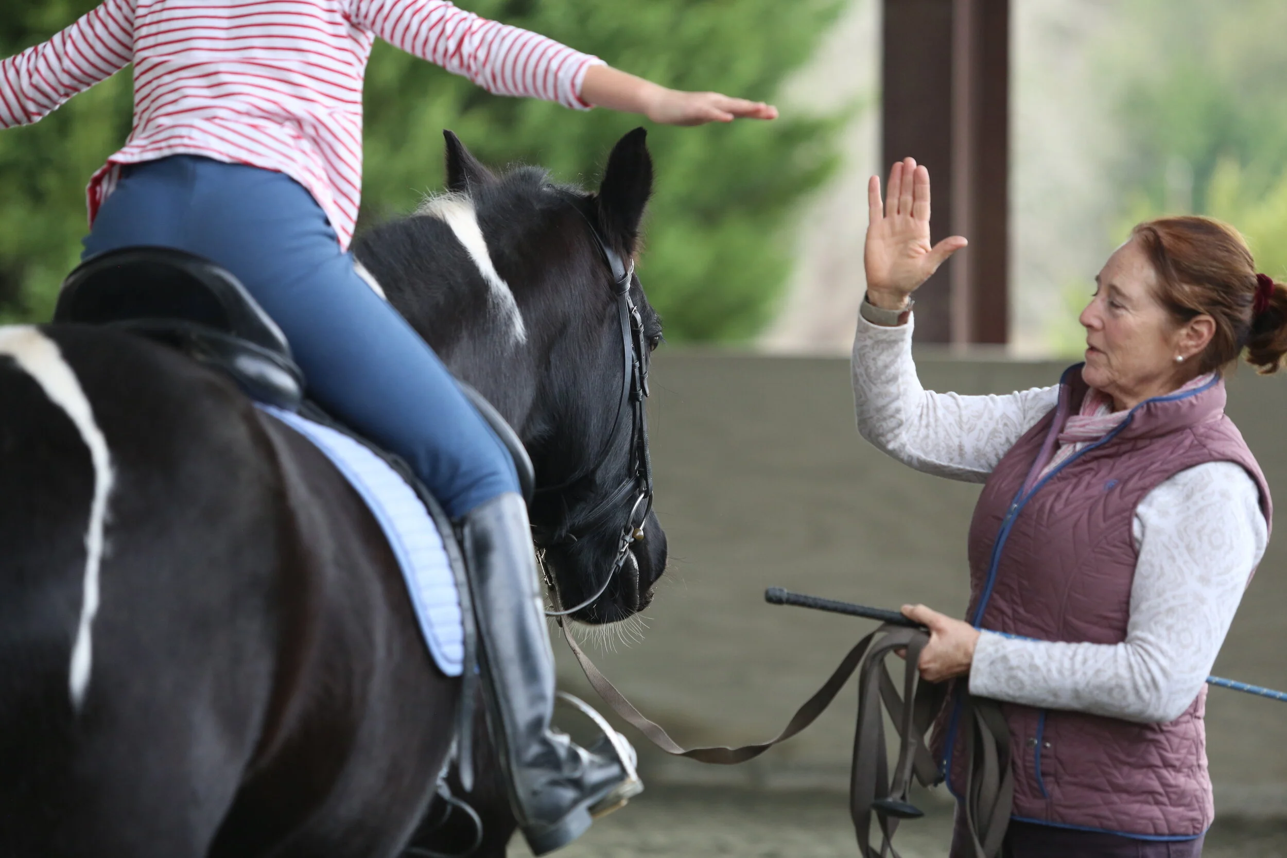 Jennifer Roth Teaching a Young Student