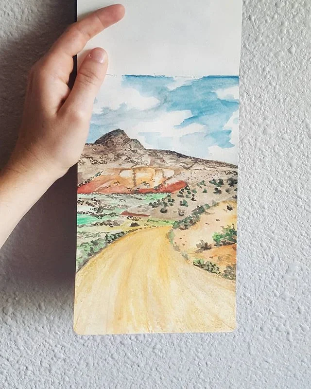 Took me 7 months,  but finally putting my watercolor sketchbook to use 😅
.
.
.
#imissedthis #watercolor #painting #texture #desert #optoutside #mountains #orange #roadtrip #newmexico #create