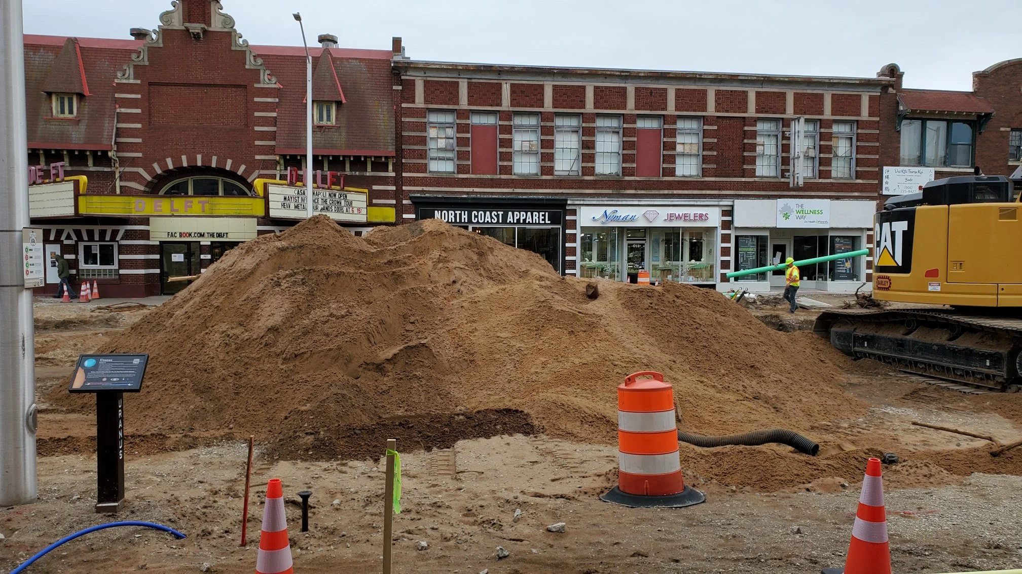 A photo of a large pile of dirt and construction equipment where the road used to be outside the Canterbury bookstore