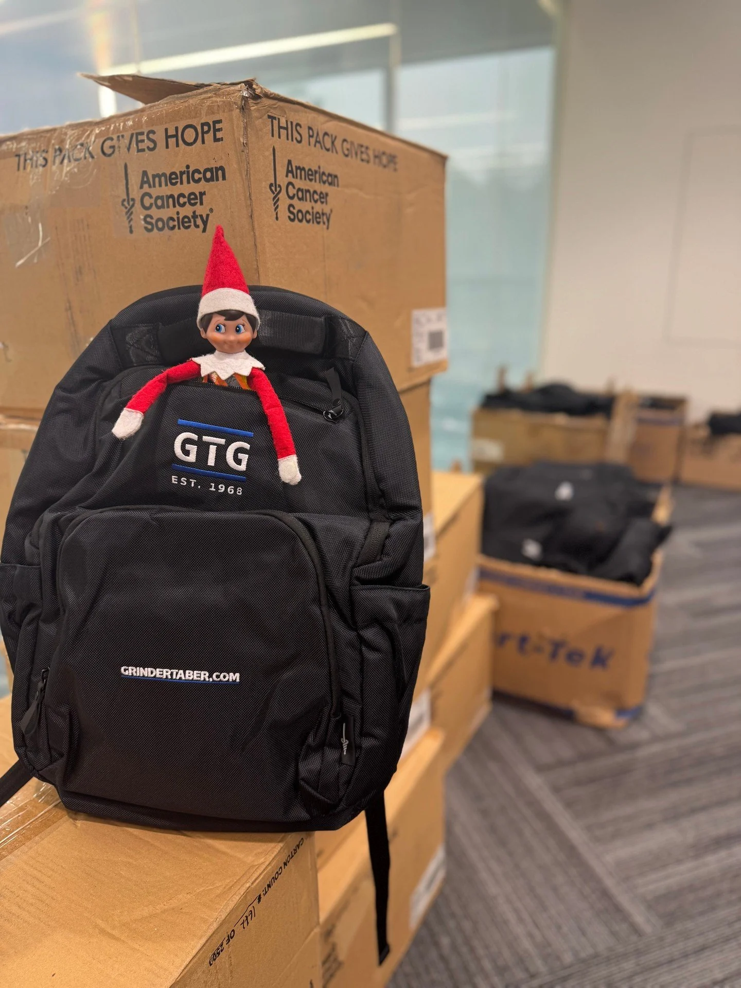 🎄📦 HE&rsquo;S BAAAACK!
Curley the Elf just made his grand return to the GTG office and he didn&rsquo;t come empty-handed.
He rolled in with a mountain of merch boxes and says they&rsquo;re &ldquo;for everyone on the Nice List.&rdquo; 
He&rsquo;s se