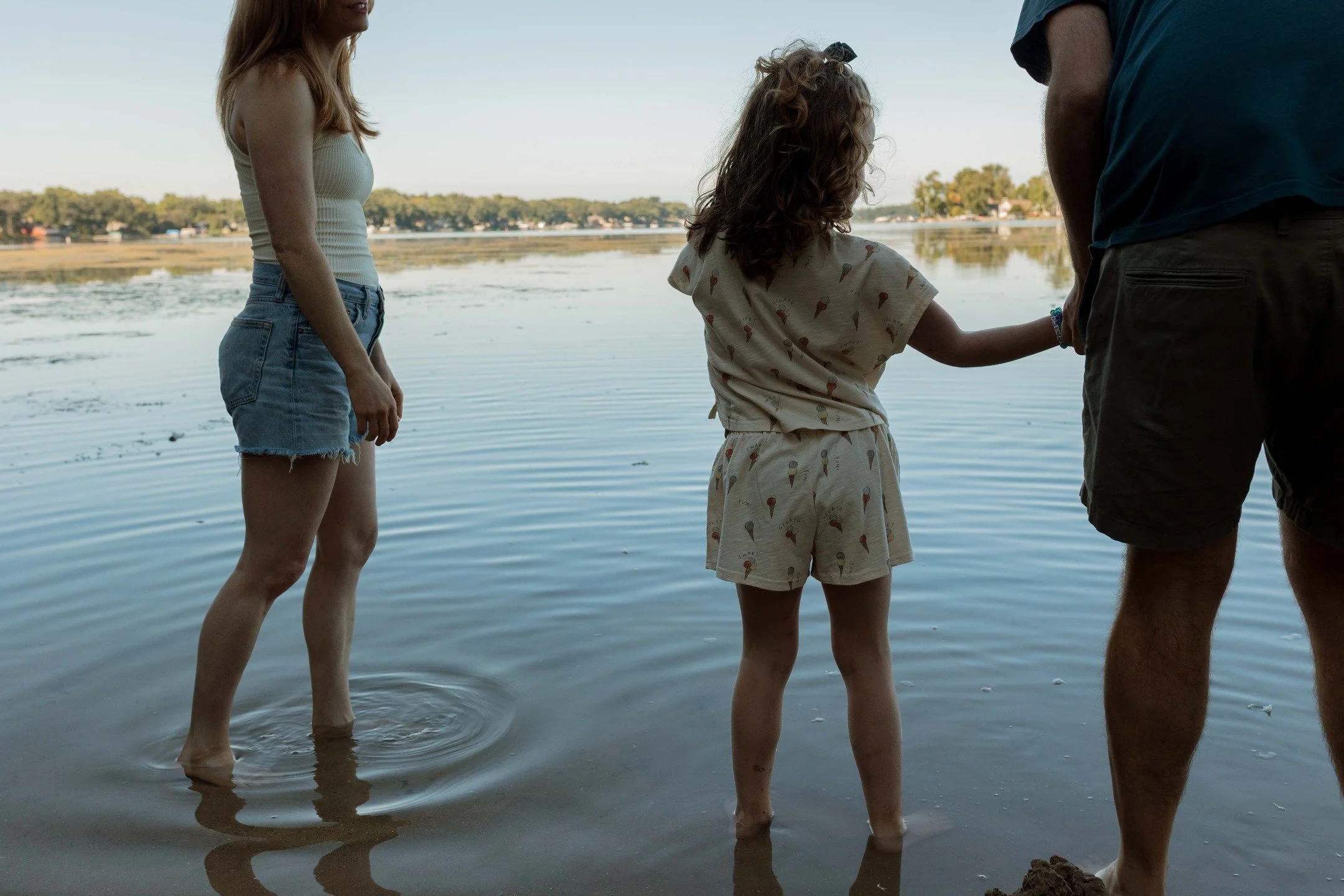 Sarah wanted to bottle up this summer with a quick photoshoot by the lake. We met on a Sunday morning, we caught up while I captured their family skipping rocks, smelling flowers and just being together. I got to witness these two exchange vows 8 yea