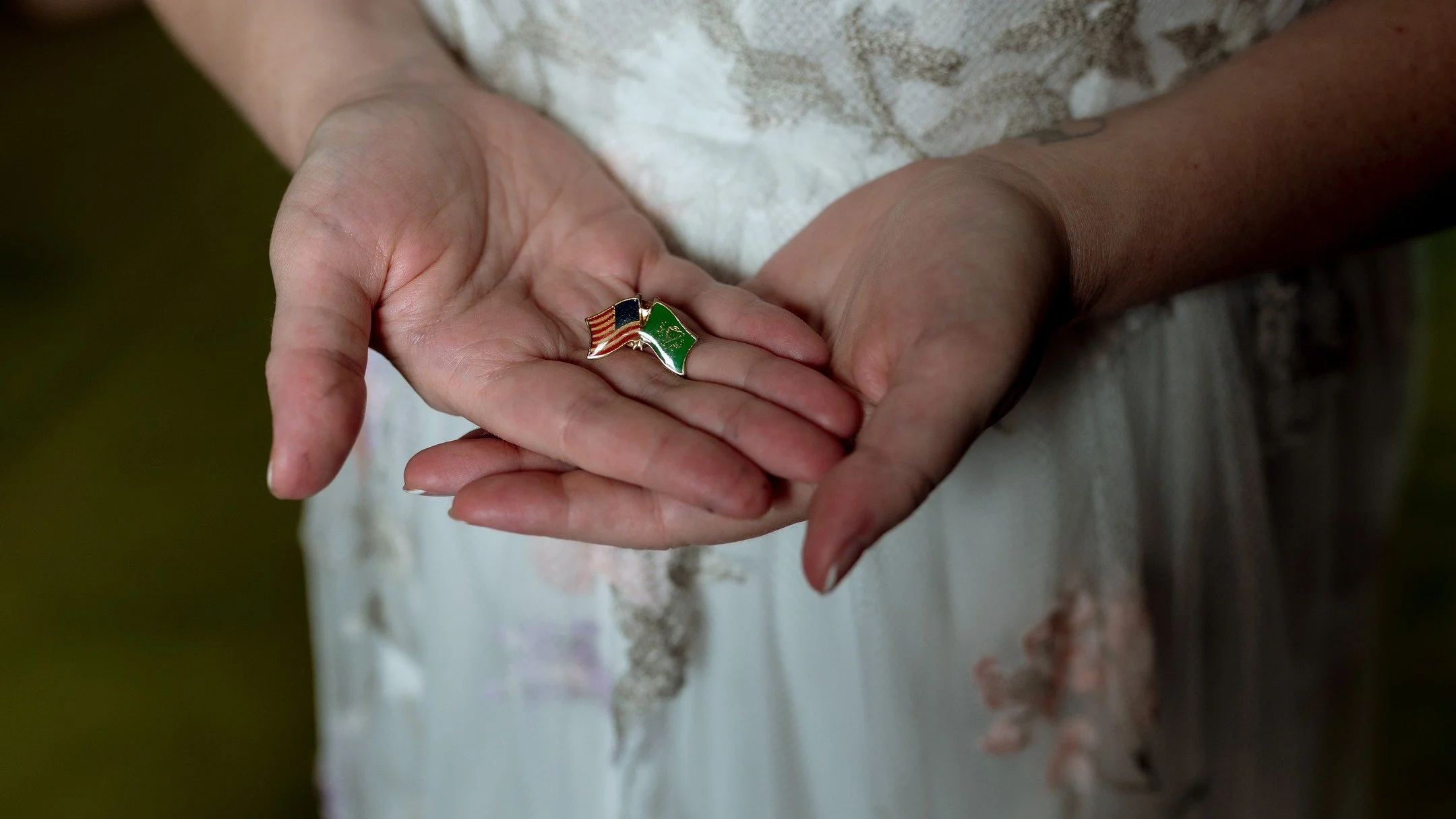 Kristin's Father is no longer with us and she wanted him near her on her wedding day so she and her Mama took the pin he wore everyday and put in on her bouquet and they gave him a little kiss. 

I like sharing the pretty portraits and the "big 