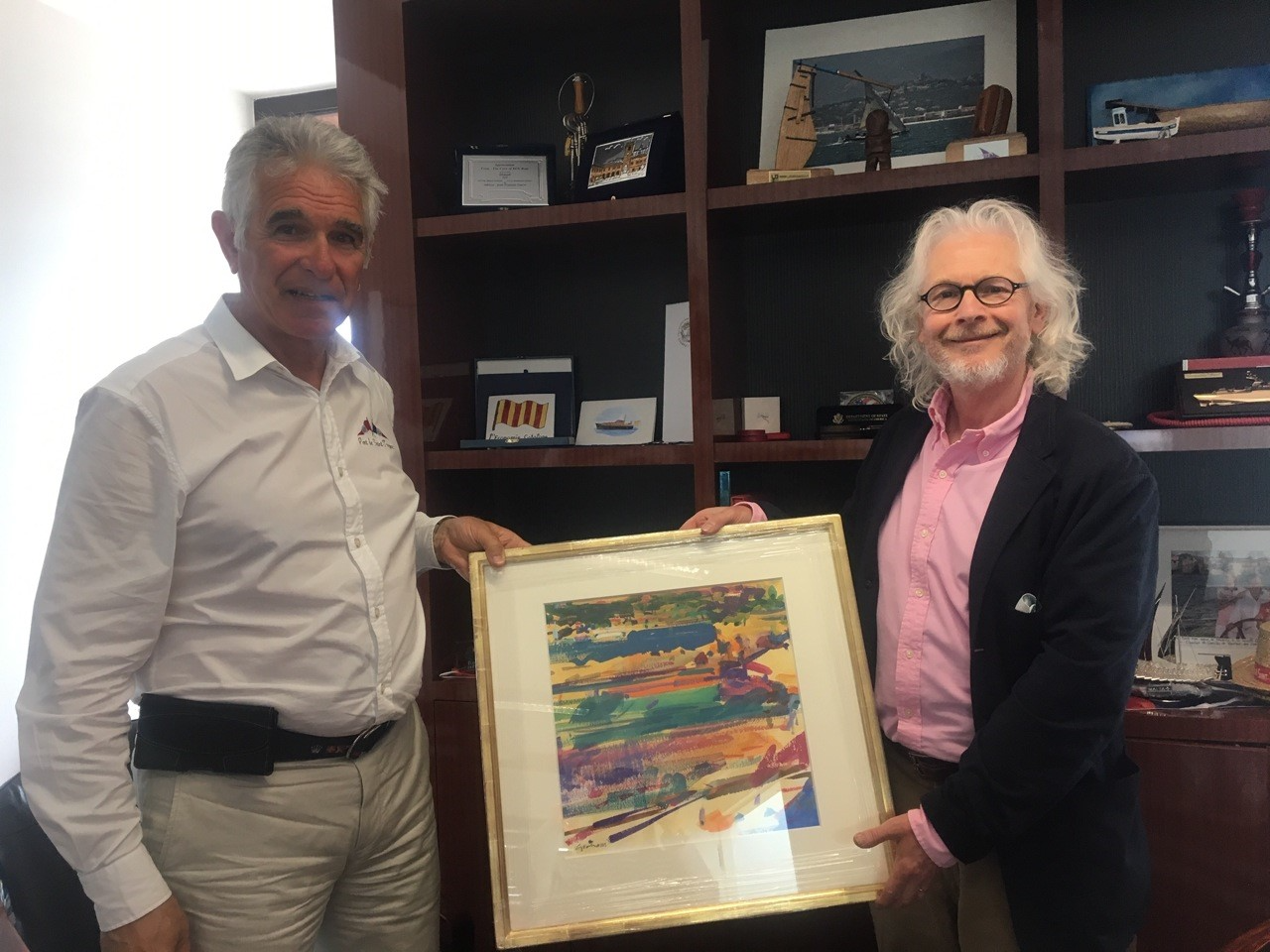Monsieur Jean-François TOURRET Directeur du Port de Saint-Tropez with Peter Graham presenting his painting 'Les Graniers' in May this year