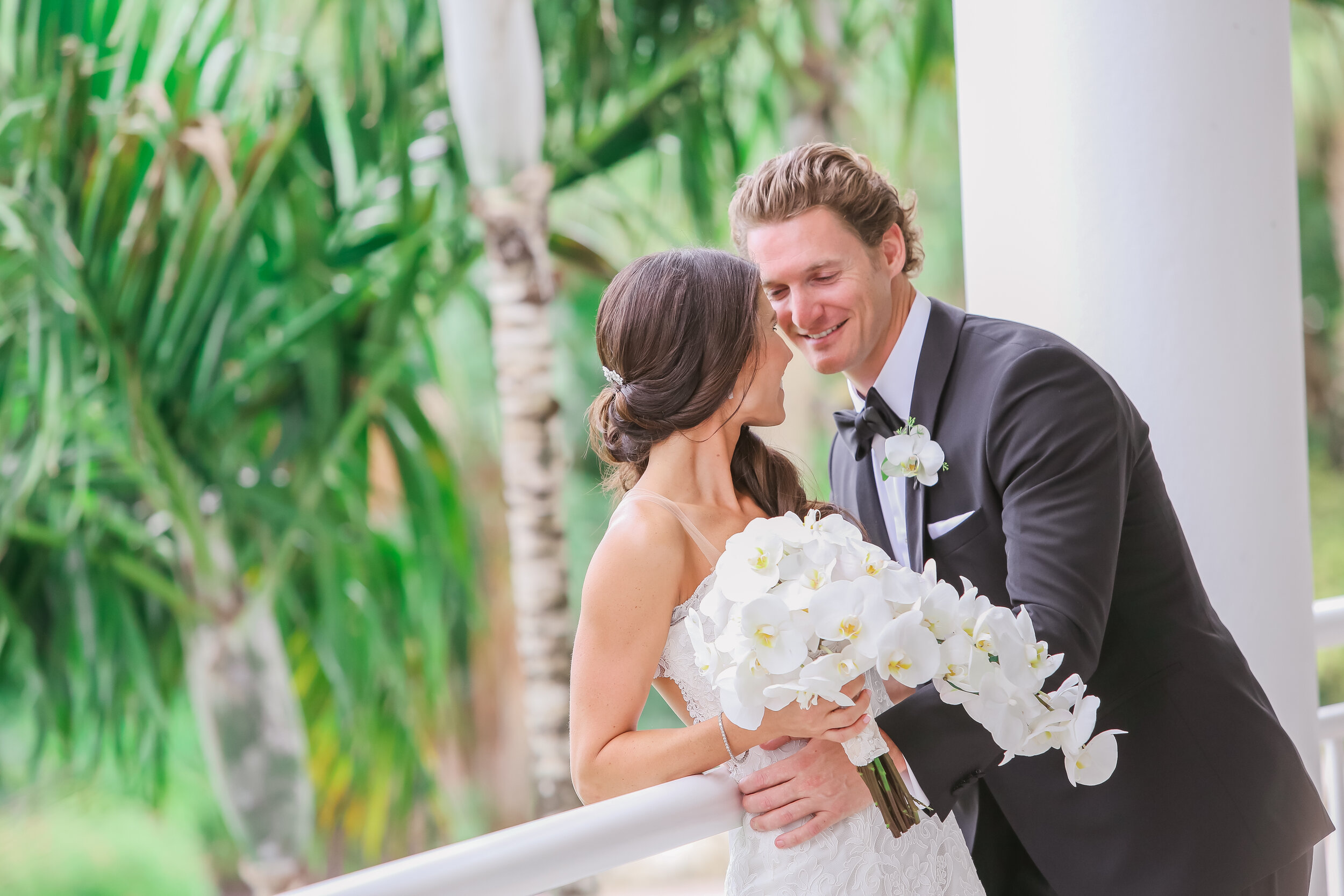 bride  and groom at balcony staring at each other.JPG