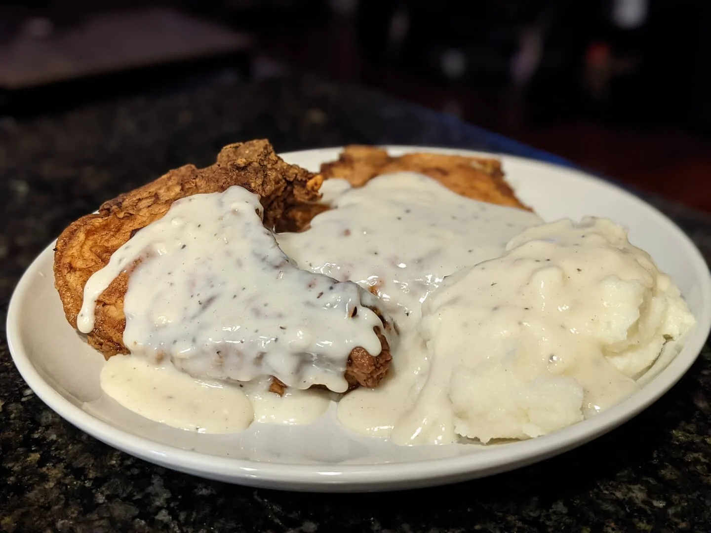 The theme for today is &quot;country&quot;! 🤓🤤 I went full country with Deep Fried Pork Chops, Buttermilk Mashed Potatoes, and Country Gravy! This is literally not for the faint of heart. This is probably the only time I can eat a meal like this in