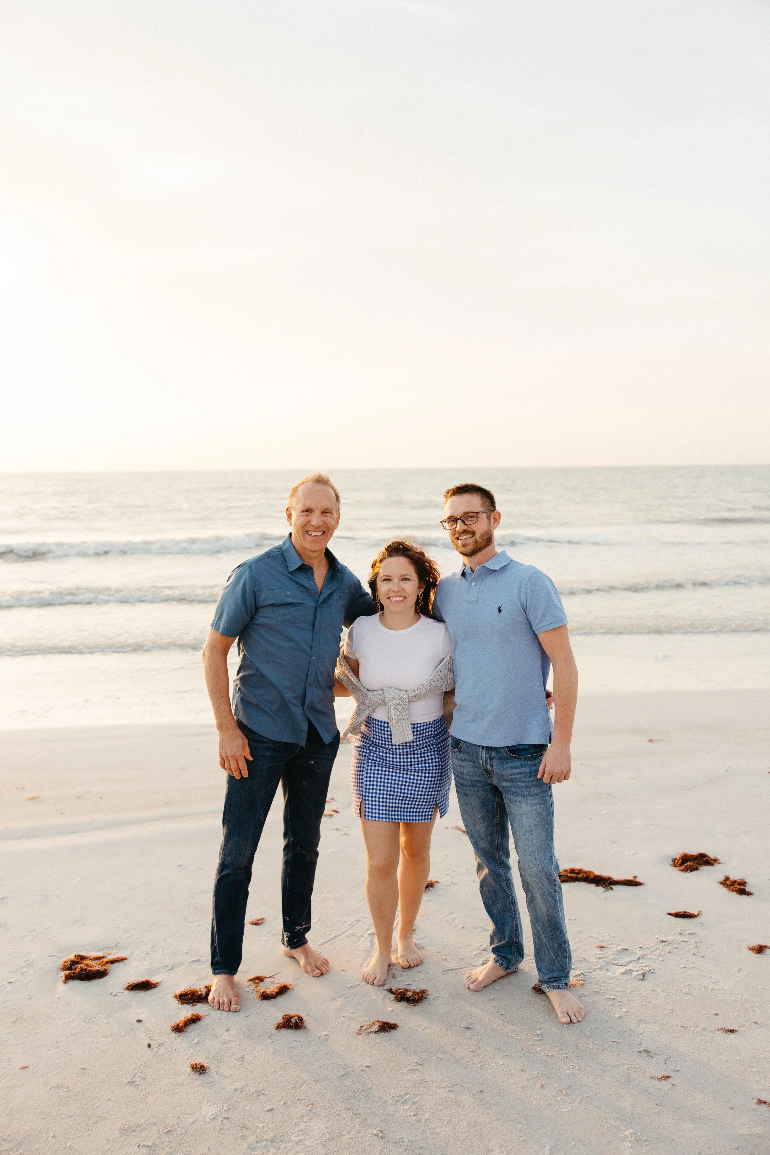 Walt Gutowski, Jessica Gutowski-Slaydon & Walt Gutowski III posing on the beach