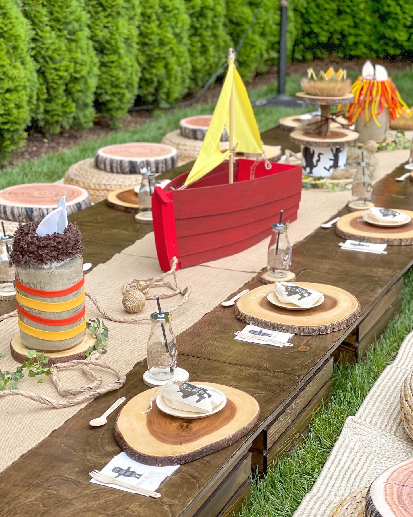 A wild rumpus picnic setup was a part of our &lsquo;Where the Wild Things Are&rsquo; customized party!  This amazing tablescape brought some of the characters&rsquo; vibes into life. We loved how everything came together after finding and creating th